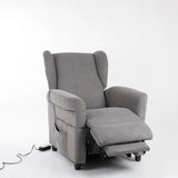 "Lift-Relaxsessel Chanel von egoista in Grau mit ausgefahrener Fußstütze und motorisiertem Relax-Mechanismus, gepolsterter Rückenlehne und seitlicher Tasche – ideal für entspannte Sitz- und Liegepositionen sowie als Pflegesessel für Senioren.