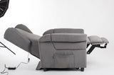Lift-Relaxsessel Chanel von egoista in Grau, seitlich aufgenommen in vollständig ausgeklappter Liegeposition mit ausgefahrener Fußstütze und elektrisch verstellbarem Mechanismus – ideal für höchsten Komfort und als Pflegesessel für entspannte Ruhephasen.