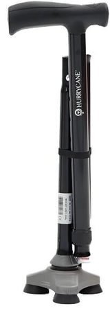 Faltbarer Gehstock Hurrycane in Schwarz mit ergonomischem Griff und rutschfestem Gummifuß, zusammengefaltet stehend.